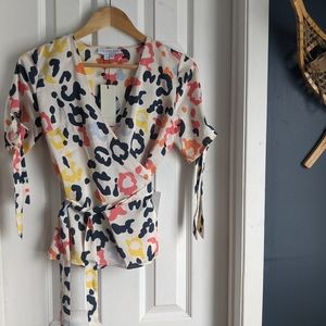 NWT Never fully dressed wrap top size small